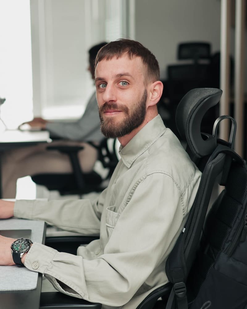 A member of the TekPiq team at their desk